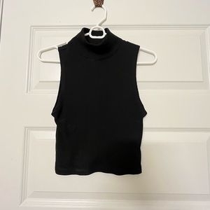 Forever 21 ribbed black sleeveless turtleneck.